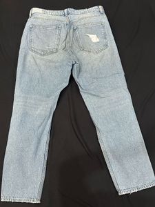Distressed Blue Denim Jeans