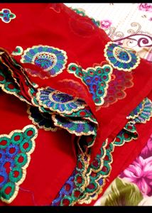 Georgette Red Saree With Embroidery .
