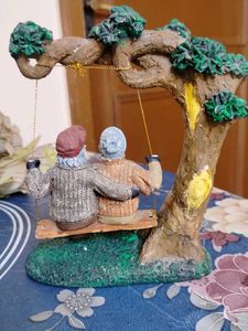 Vintage Couple on Swing Figurine