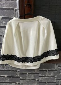 Elegant Off-White Skirt with Black Lace Trim