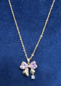 Gold Bow Pendant Necklace
