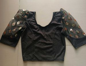 Elegant Black Blouse with Sheer Sleeves