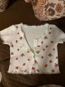 Coquette white rib-knit floral baby tee