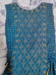 blue gown with stones emblisment