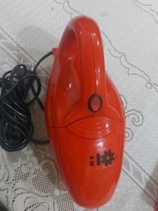 Red hand-held corded electric Vacuum Cleaner