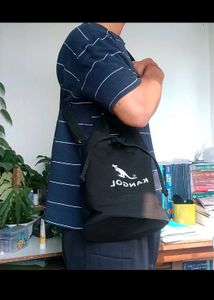 kangol bucket drawstring sling bag