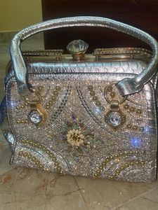 silver solid hand bag