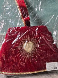 Elegant Red Velvet Clutch with Heart Design