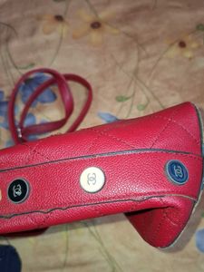 The red quilted hobo handbag