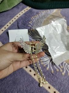 Butterfly Clutcher