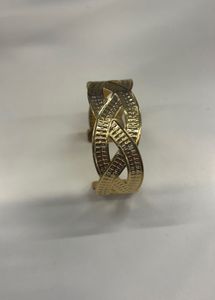 Elegant Gold Tone Cuff Bracelet