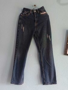 Distressed Blue Denim Jeans