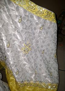 Elegant Yellow and White Saree