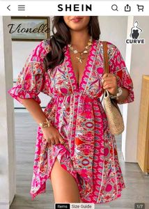 339. Bohemian Print V-Neck Mini Dress