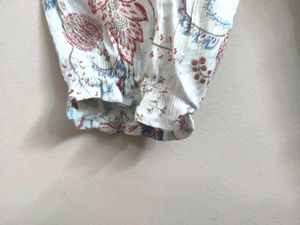 FLORAL PRINT TOP WITH NECK TIE-UP