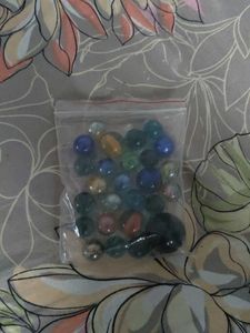 Bag of colorful glass marbles