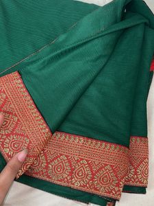 Elegant Green Saree with Red Border