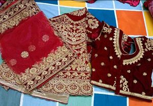 Stunning Red &amp; Gold Embellished Lehenga Choli