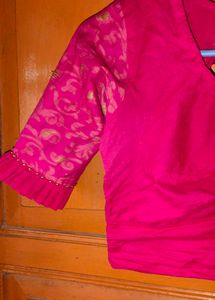 Vibrant Pink Blouse with Elegant Sleeves