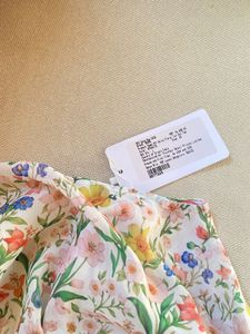 off Floral Print cut out top.