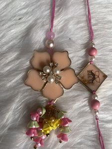 Unique Rakhi Set with Flower Charm