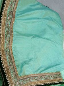 Elegant Teal Silk Saree with Zari & Pearl Work