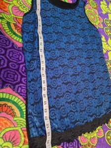 Elegant Blue Lace Top with Black Skirt