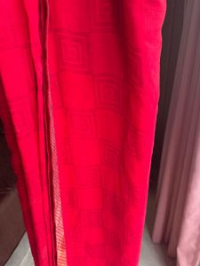 Vibrant Pink Saree with Decorative Border