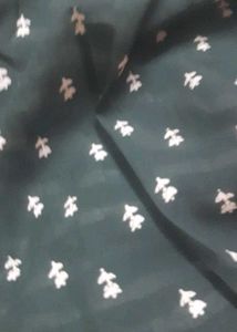 Elegant Green Saree with White Zigzag Print