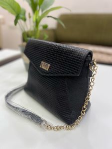 Leather Sling Bag.