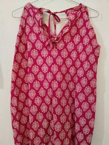 Pink Printed Tie-Up Neck Sleeveless Short Kurti
