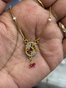 Elegant Gold Necklace with Ruby Accent