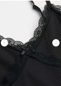 Chic Black Ribbed Mini Dress with Lace Trim