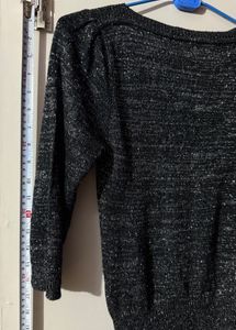 Black stylish top with shimmery interlacing