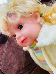 Cute Doll with Blonde Pigtails