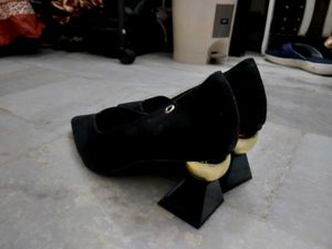 Macy Alfani's First Copy Golden Ball Bottom Heels