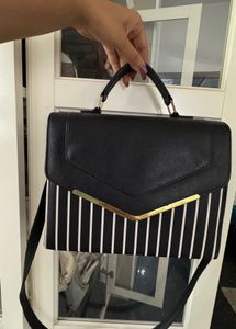 Chic Black & White Striped Handbag