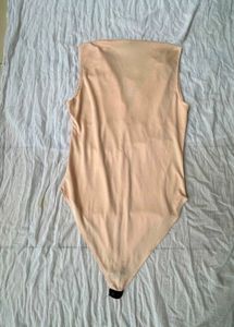 Sleek Peach Bodysuit