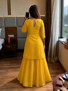Vibrant Yellow Kurta Set with Pink Dupatta