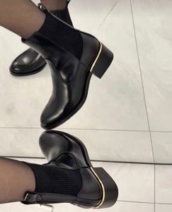 Zara gold trim Chelsea boots