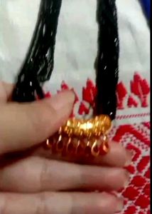 Elegant Black Beaded Necklace with Gold Pendant