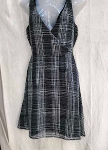 4829. Chic Black &amp; White Plaid Wrap Dress