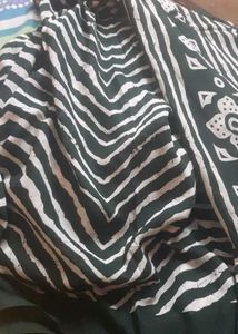 Elegant Green Saree with White Zigzag Print