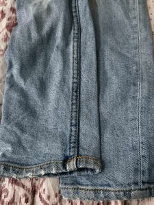 Light Wash Distressed Denim Jeans