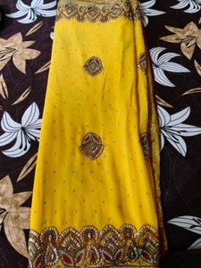 Exquisite Yellow  heavy Embellished Saree