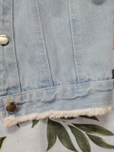 Denim Jacket with Frayed Edges