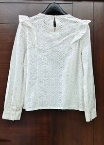 White eyelet ruffle long sleeve top