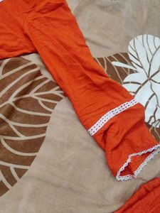 Orange Kurta with White Lace Trim