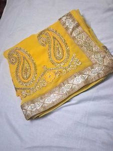 embroidery and stone work yellow color saree