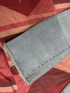 Light Wash Distressed Denim Jeans